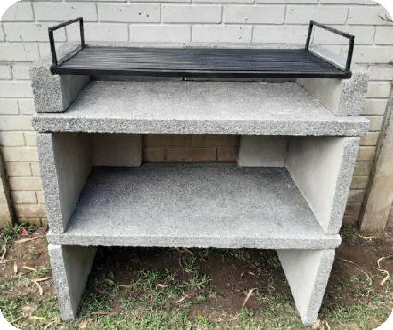 ASADOR EN PIEDRA, EN 8 PIEZAS DESMONTABLE. 1.10 M LARGO X 60 CM ANCHO X 1.05 M DE ALTO. PARRILLA 95 CM LARGO